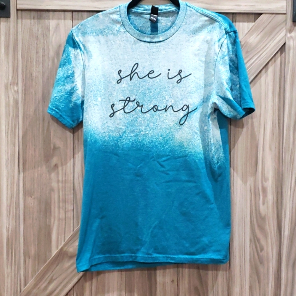 "She Is Strong" graphic tee